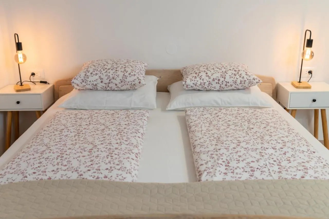 Spalnica v Apartmaju Rožič